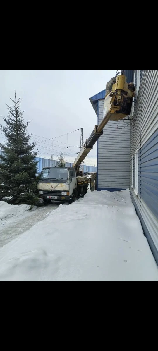 Автовышка Isuzu Elf — очистка крыш, Самара